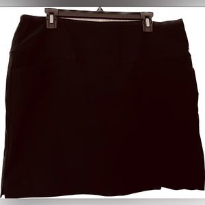 Black skort with tummy control and stretch fabric.